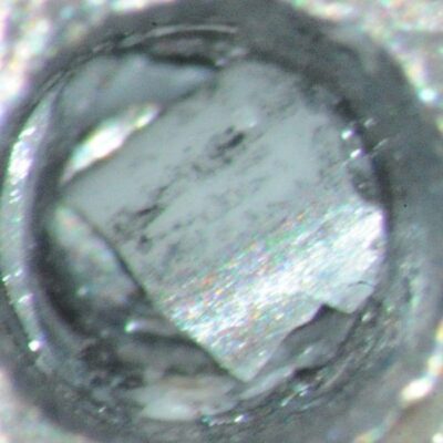 Cropped conus 5 image note titanium fragments Imbedded into the zirconia fragment from the conical wall