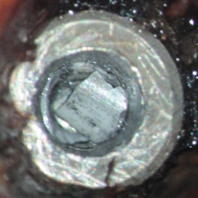 Fractured zirconia conus wall fragment