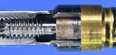 The same abutment on an open Nobel trilobe connection analog. Carefull look at the thread distortion on the end screw thread. This is from the screw bottoming into the Conical implant as shown on the left. This explains why these fragments were locked and not mobile.