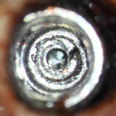 Retrieval_of_a_fractured_Straumann_Healing_Abutment_Post_Ultrasonic_Attempt_8mm .8mm bore through the fragment. Note the bore is more concentric than the initial spot in the left image
