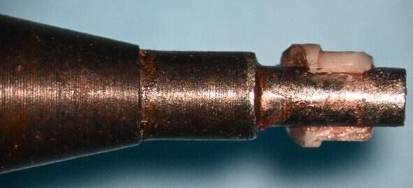 Fractured zirconia abutment on the “wobbling” tool Fractured zirconia abutment on the “wobbling” tool