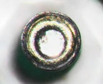 Note concentricity of drilled fragment end